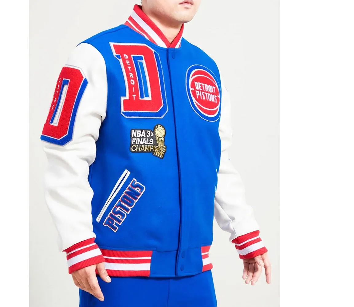 Detroit Pistons Mashup Varsity Royal and White Jacket This jacket showcases a harmonious fusion of premium quality, embroidered detailing, bold style